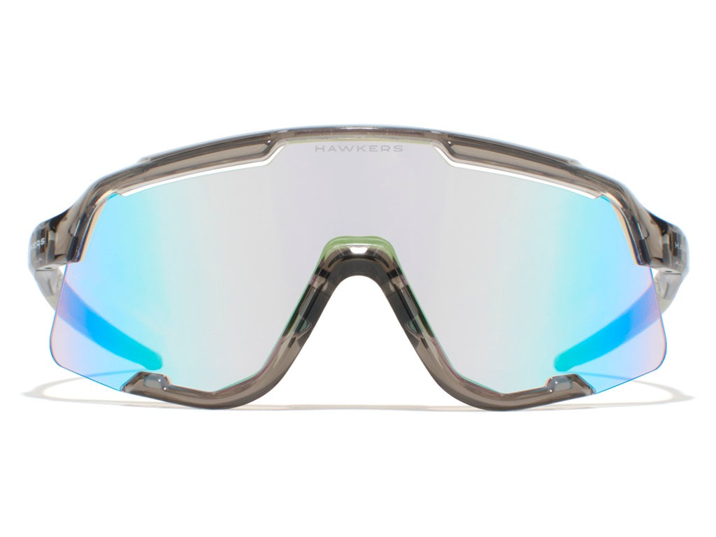 HAWKERS | Gafas POWER gris transparente brillo - Fotocromático marron/azul