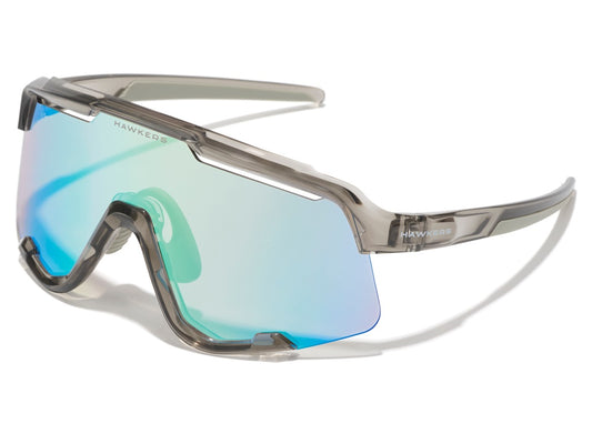 HAWKERS | Gafas POWER gris transparente brillo - Fotocromático marron/azul